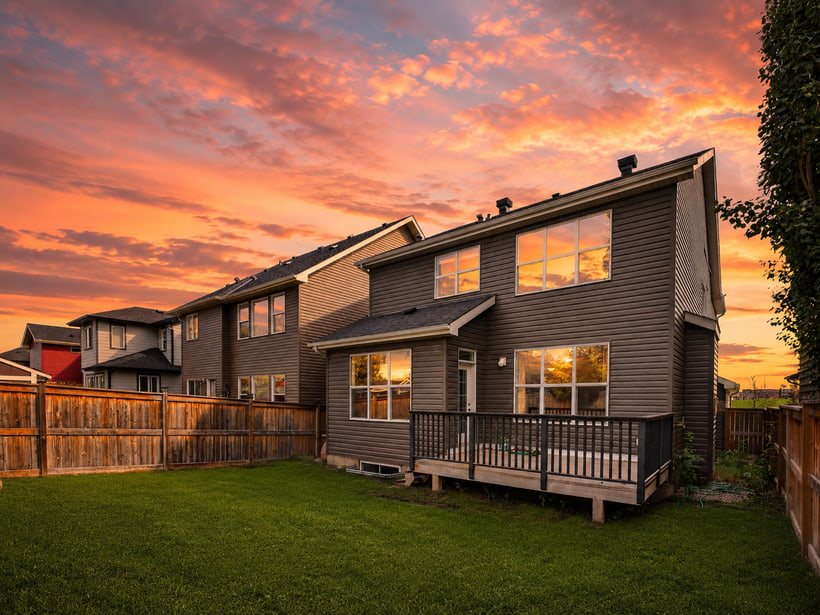 The back of the house at dusk, 370 Silverado Way SW