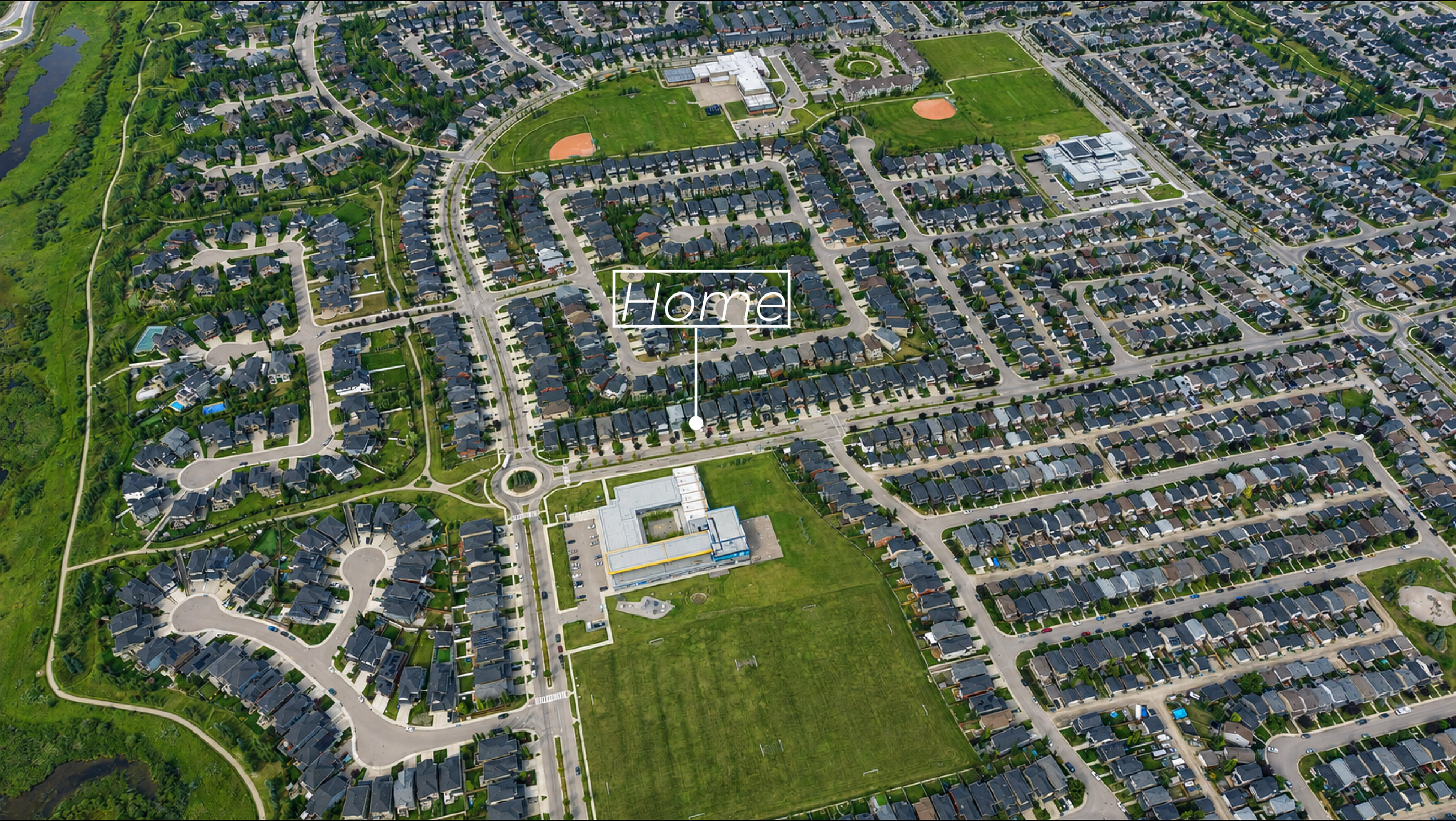 Silverado from the air, looking north. 370 Silverado Way is marked, with Ron Southern School and its field beside it and the mountains on the horizon.