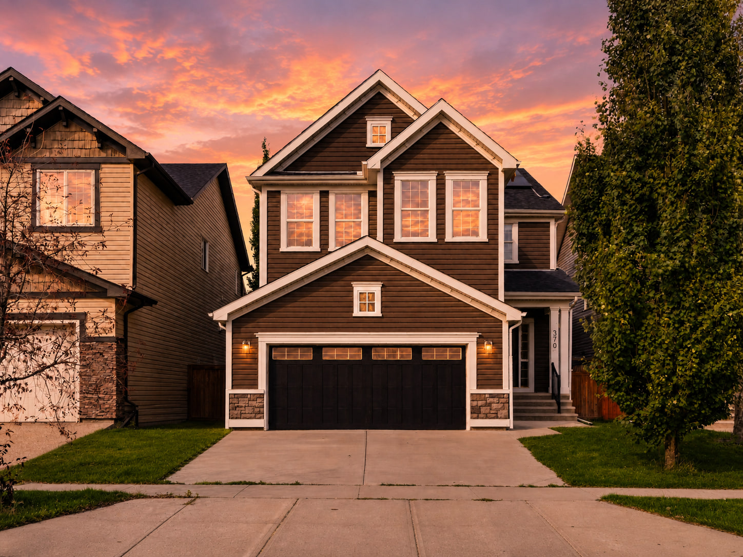 Front elevation at dusk, 370 Silverado Way SW