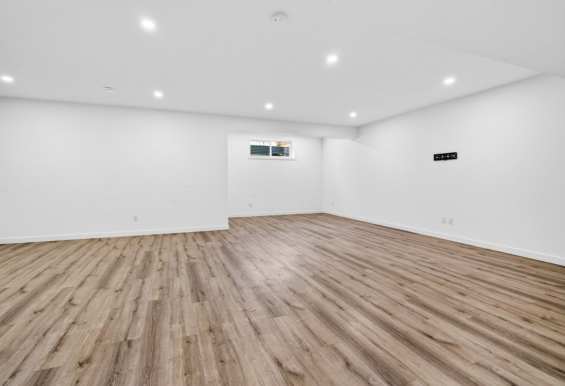 The finished lower level, 370 Silverado Way SW